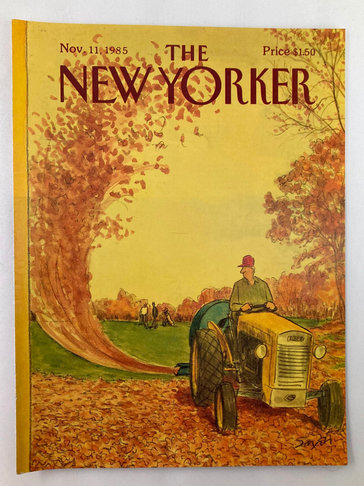 Cover Only The New Yorker November 11 1985 Fly Away by Charles Saxon, showcasing a man driving a tractor through a field covered with fallen leaves under a vibrant autumn sky.
