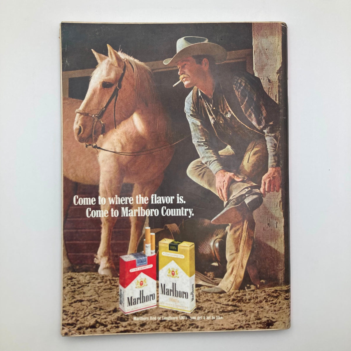 Back cover of VTG Playboy Magazine September 1969 featuring a Marlboro advertisement with a cowboy and horse, emphasizing classic Americana.
