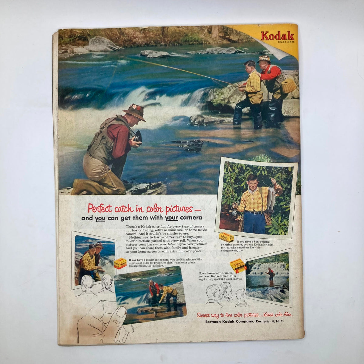 Back cover of the Saturday Evening Post Magazine from May 9, 1953, advertising Kodak color film with an illustration of fishermen by a river.