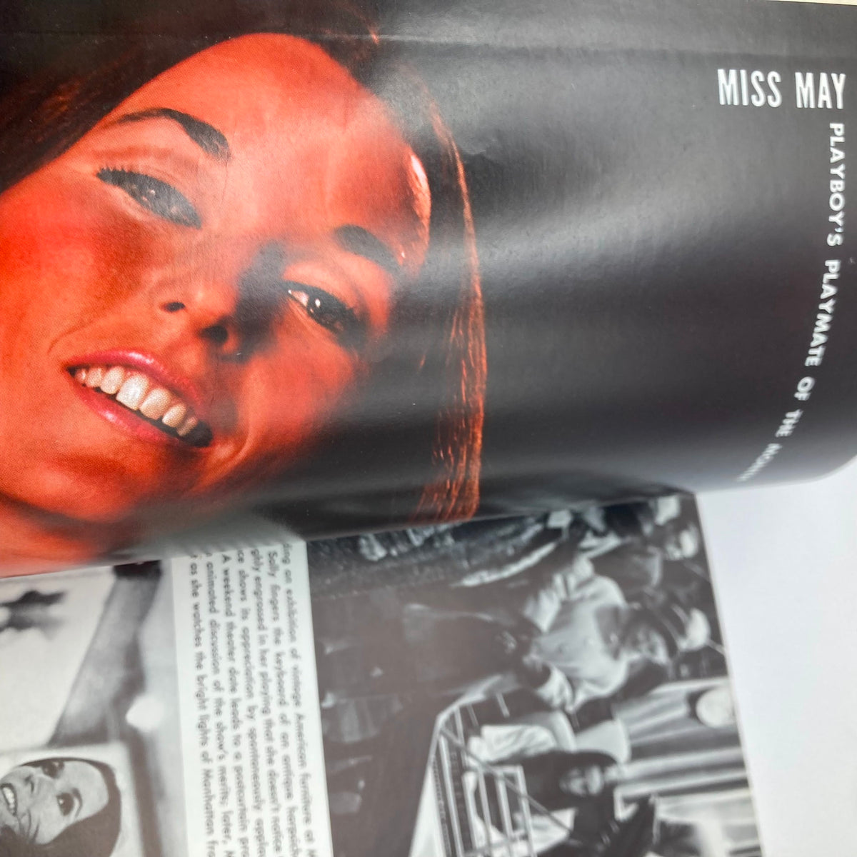 Interior page of VTG Playboy Magazine May 1969 showcasing Miss May with a vibrant portrait and nostalgic design.