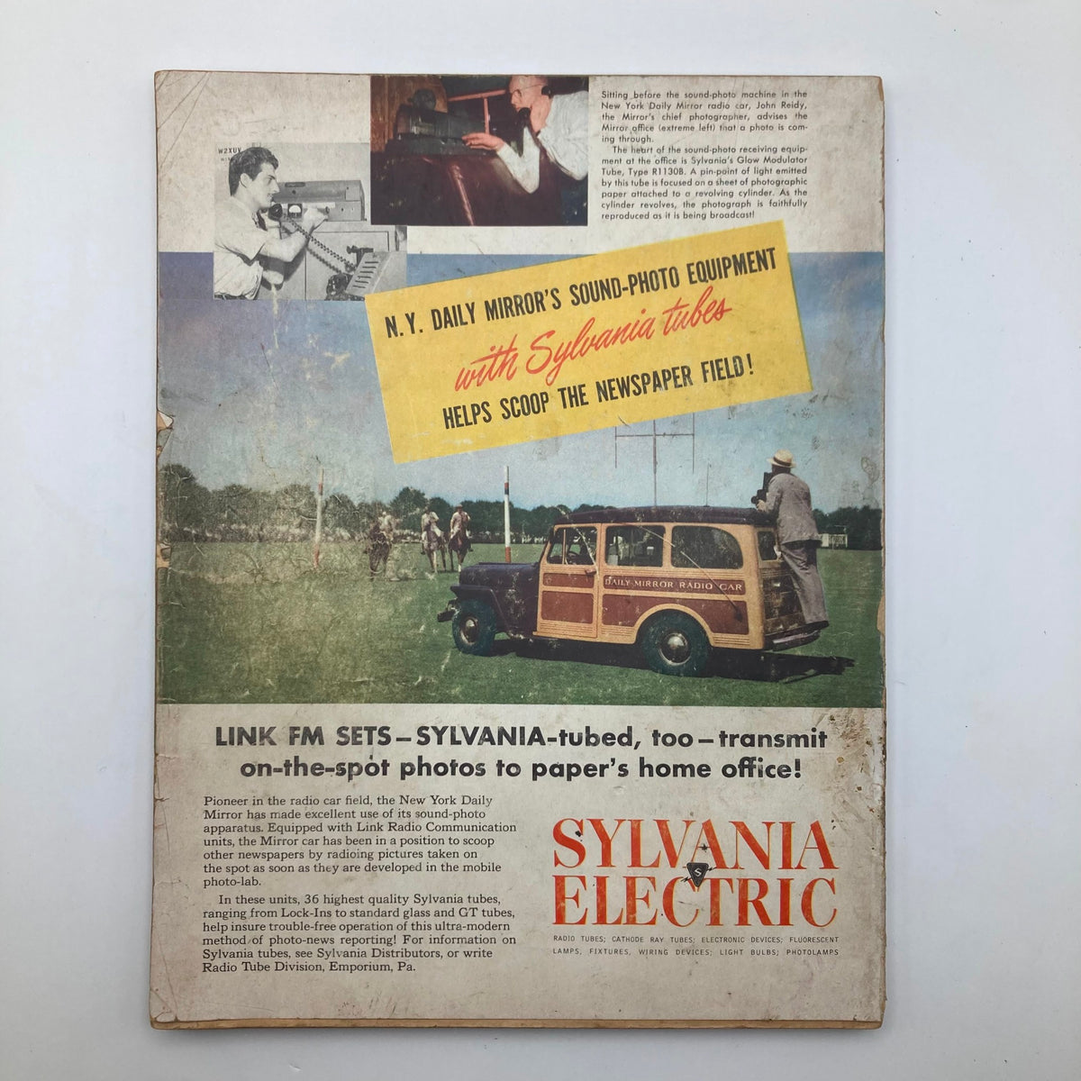 Back cover of VTG Radio & Television News Magazine October 1948 advertising Sylvania Electric's sound-photo equipment, featuring a vintage car and newspaper field.