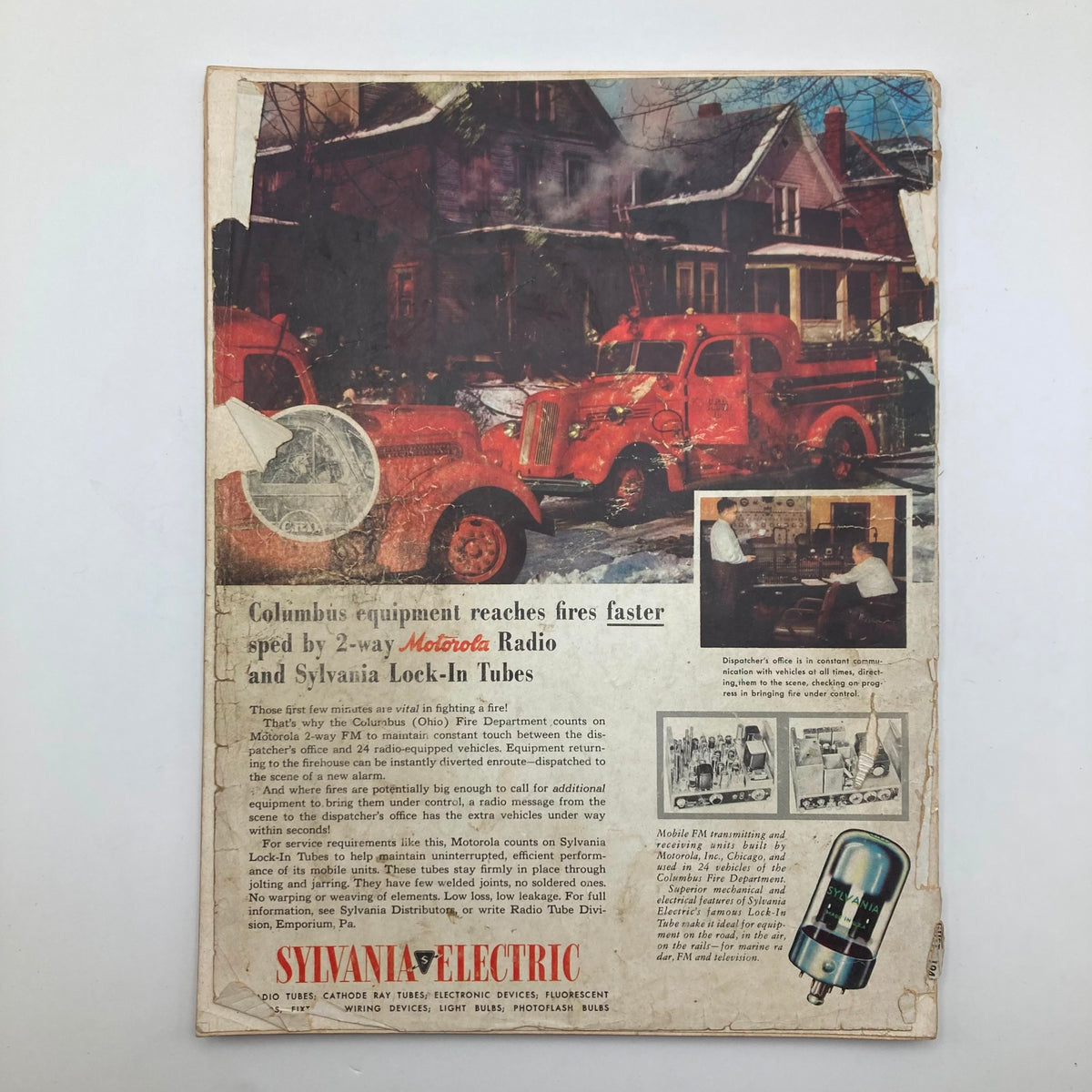 Back cover of VTG Radio & Television News Magazine August 1952, highlighting Motorola Radio and Sylvania Lock-In Tubes, with images related to fire equipment and communication technology.