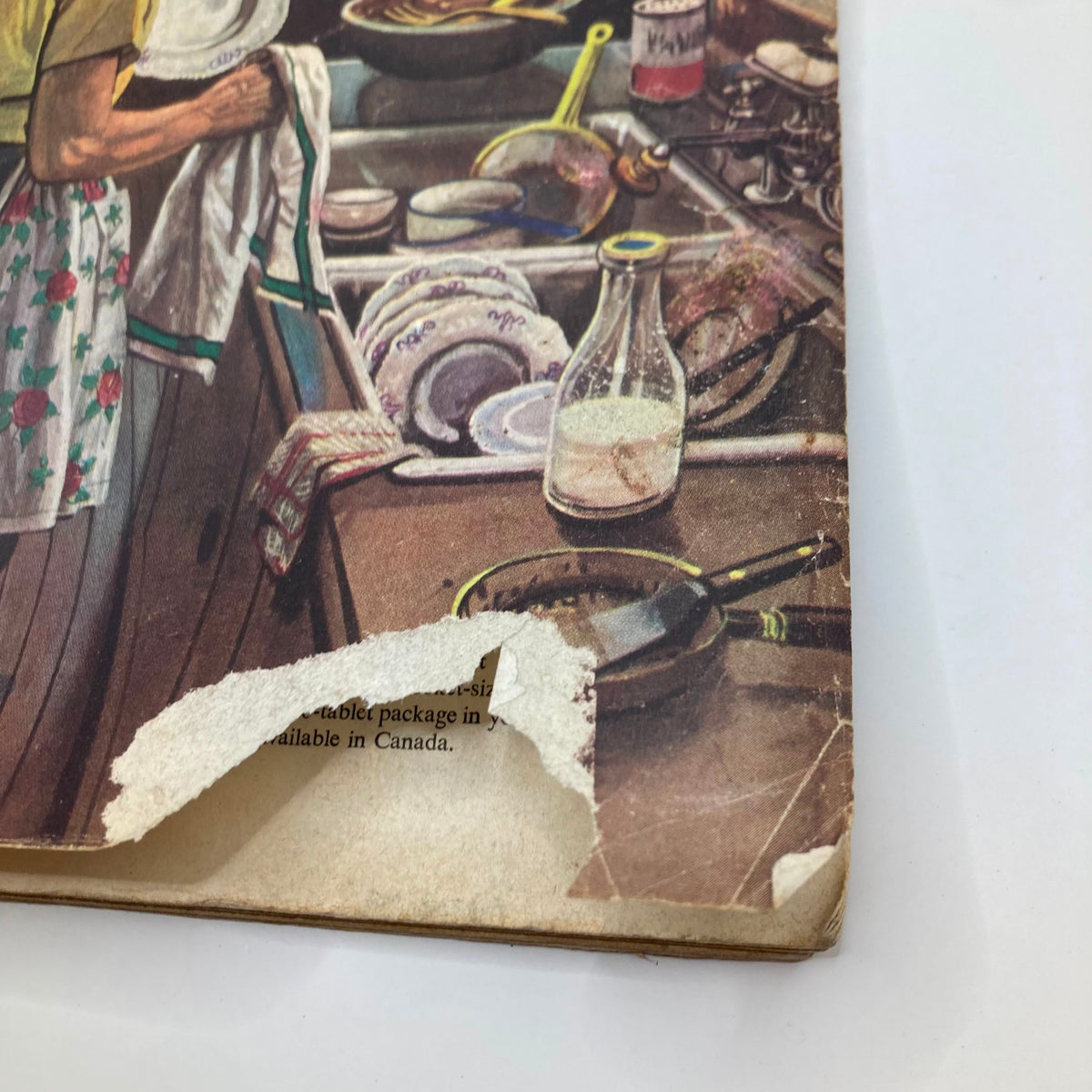 Close-up of the damaged corner of the July 19, 1952 Saturday Evening Post Magazine, illustrating the vintage wear and tear, beautiful artwork by Stevan Dohanos.