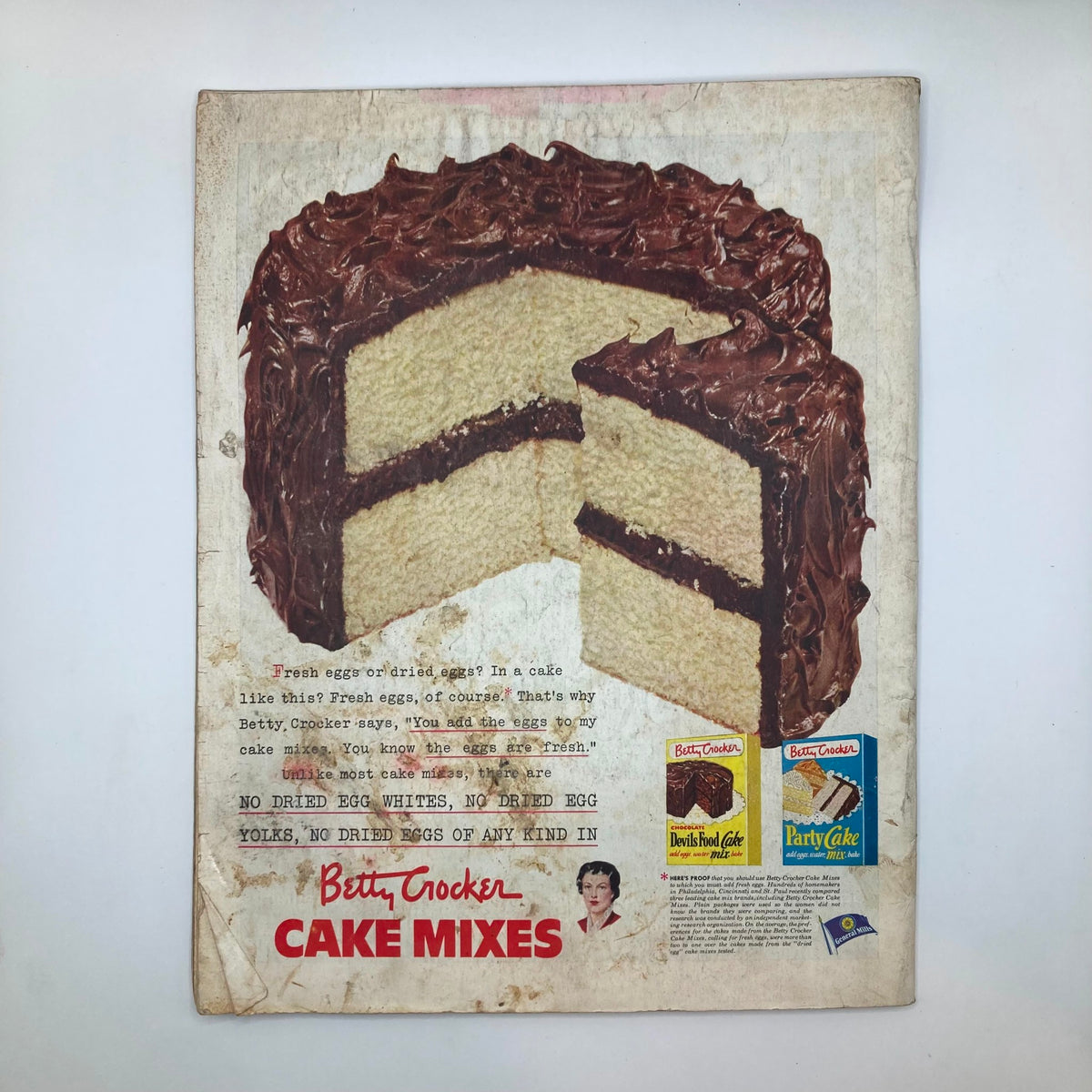 Back cover of the Saturday Evening Post Magazine July 19, 1952, featuring an advertisement for Betty Crocker Cake Mixes with a delicious cake image.