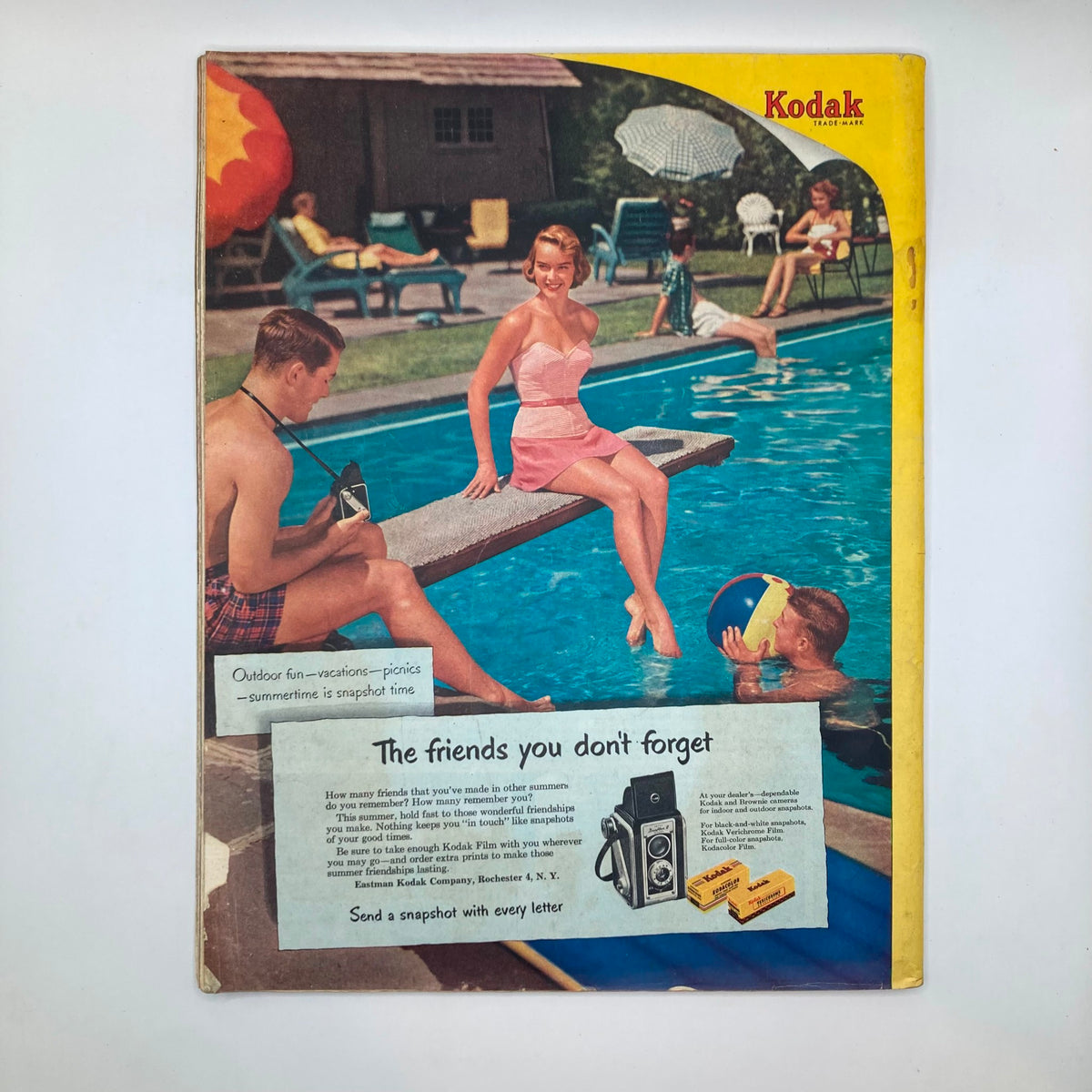 Back cover of Saturday Evening Post Magazine June 7 1952, showcasing a Kodak advertisement with a vintage swimming pool scene.