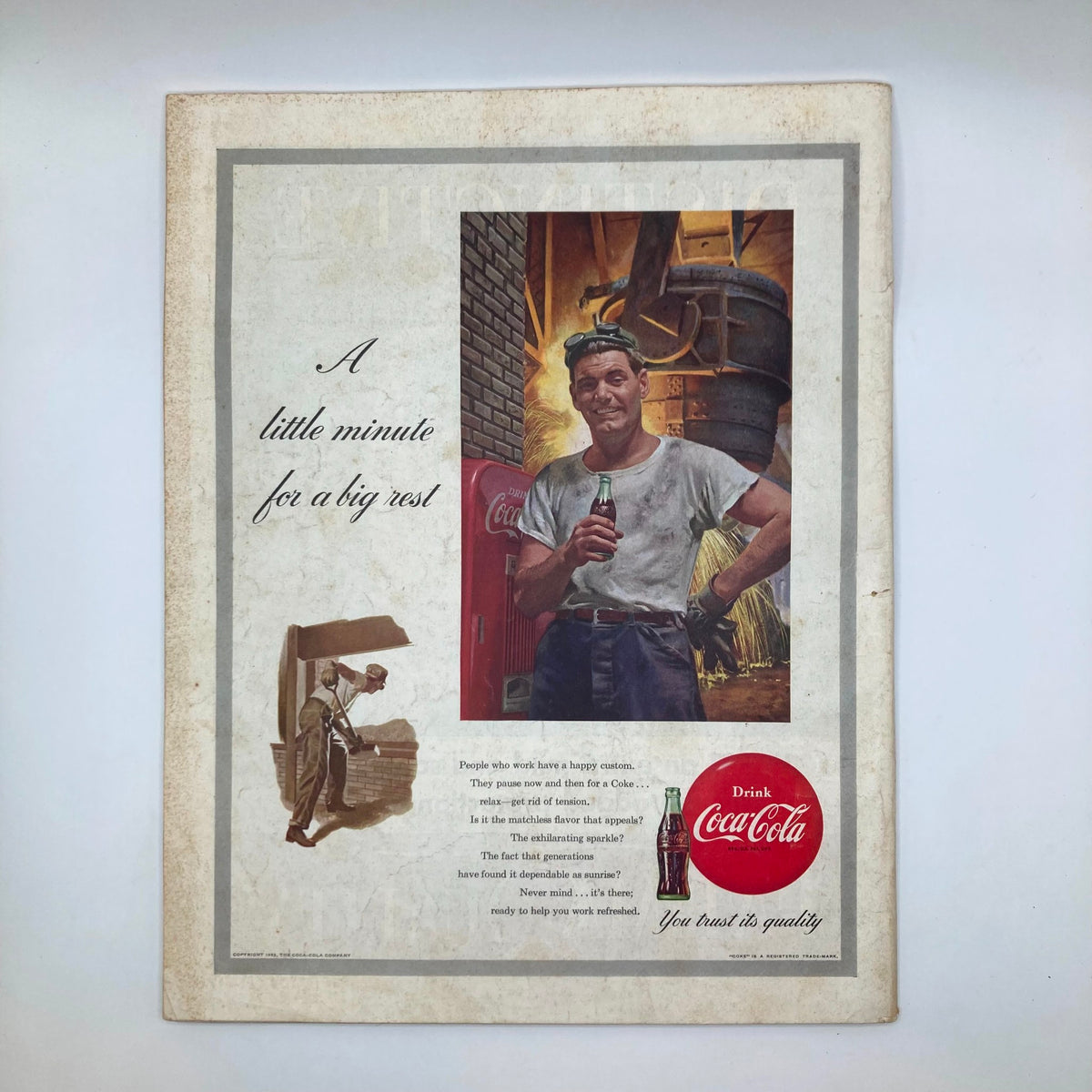 Back cover of Saturday Evening Post Magazine January 24, 1953 advertising Coca-Cola with a depiction of a man enjoying a drink during work.