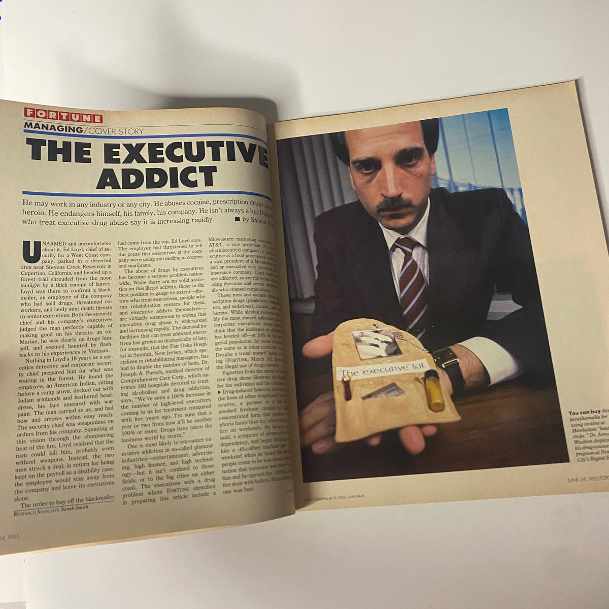 Interior page of Fortune Magazine June 24, 1985, showcasing the cover story 'The Executive Addict' with a photo of a businessman holding a model kit.