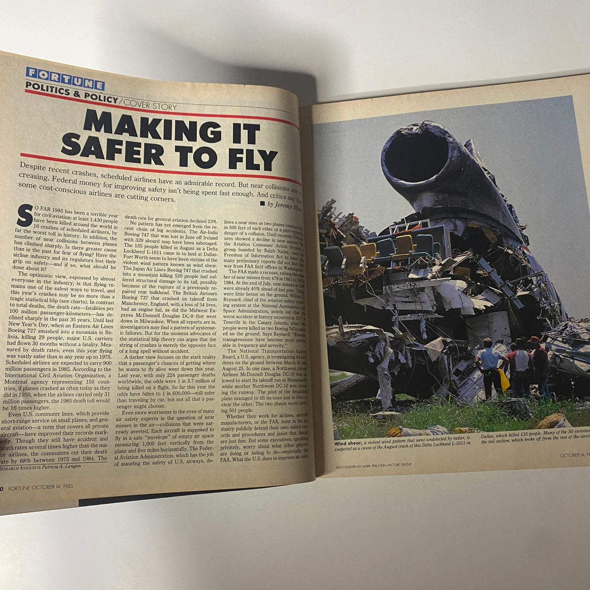 An article spread from Fortune Magazine October 14, 1985, featuring the cover story 'Making It Safer to Fly', discussing aviation safety amid recent airline incidents, with a related image of a plane crash.