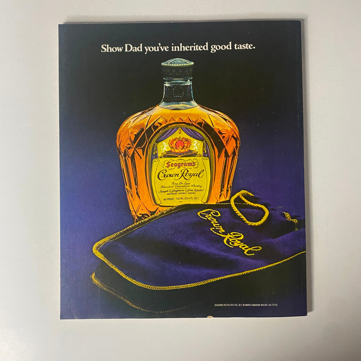 Seagram's Crown Royal whiskey advertisement featuring a bottle and velvet pouch, promoting good taste, designed for Father's Day gifting. From the Fortune Magazine June 5, 1978 issue.