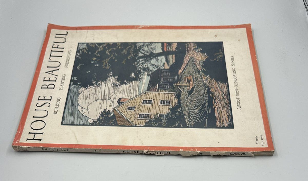 House Beautiful Magazine August 1929 cover featuring a rustic house surrounded by trees.
