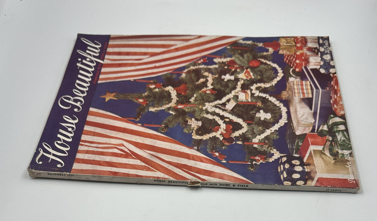 Side view of House Beautiful Magazine, December 1938, showcasing the Christmas tree cover design with red and white striped curtains and a festive display of gifts.