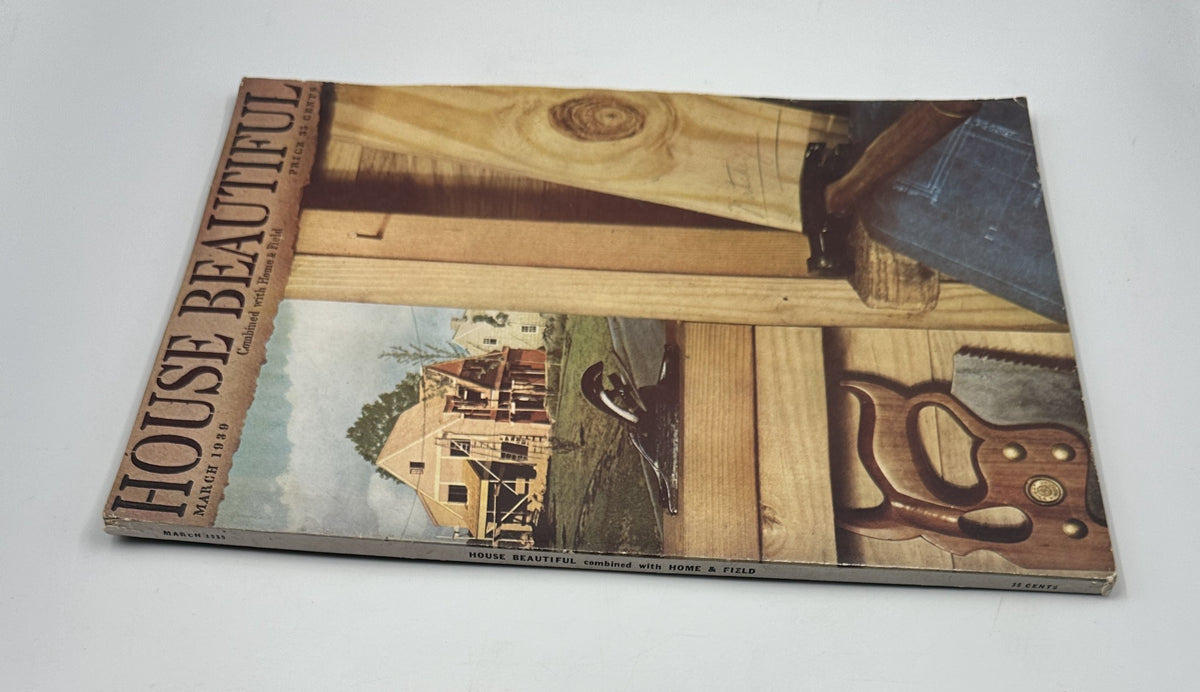 Side view of the March 1939 House Beautiful magazine showing the cover design and an image of a building project. Highlights the theme of the Small House Competition.