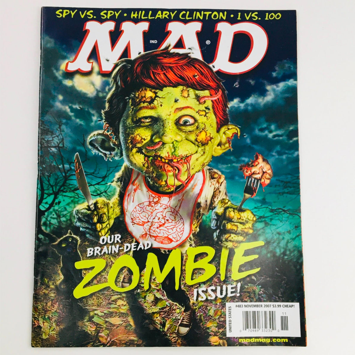 Mad Magazine November 2007 No. 483 Our Brain-Dead Zombie Issue cover featuring a humorous zombie character with a brain illustration, emphasizing the magazine's vintage appeal and satirical content.