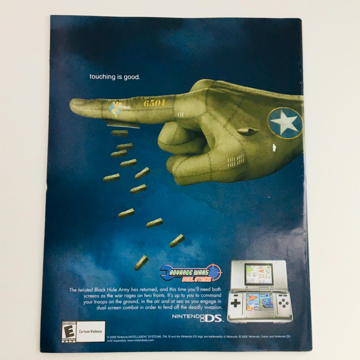 Back cover of Mad Magazine October 2005 No. 458 displaying a promotional advertisement for a Nintendo DS game featuring a cartoonish hand and the text 'touching is good'.