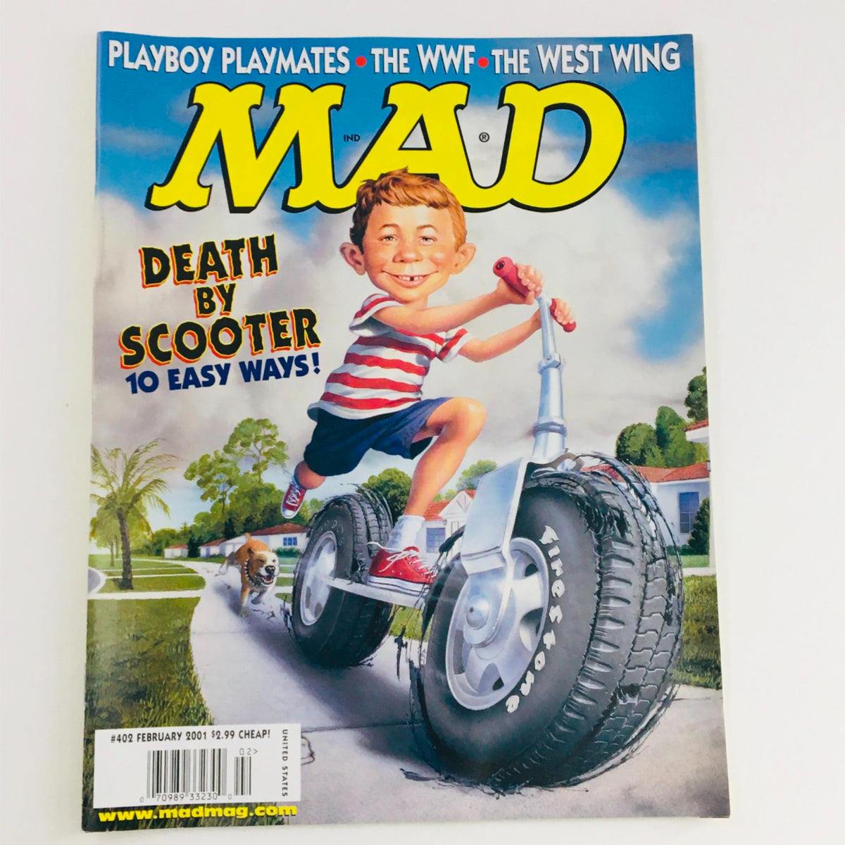 Cover of Mad Magazine February 2001 No. 402 featuring the title 'Death By Scooter: 10 Easy Ways' with an illustration of a boy riding a large scooter and a dog in the background. Vintage collectible magazine showcasing early 2000s humor.