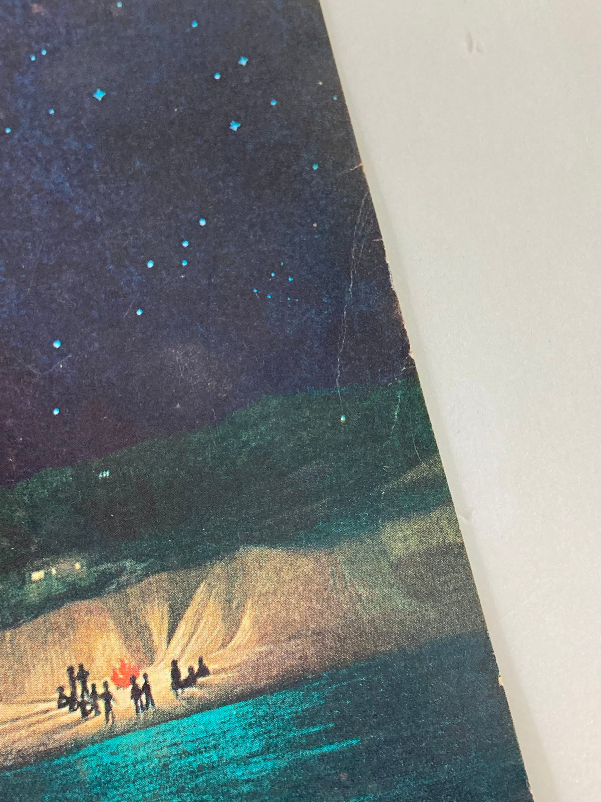 Close-up of The New Yorker magazine cover, September 2, 1974, titled 'Bonfire' by Charles E. Martin, highlighting details of the artwork with stars and a gathering around a campfire.