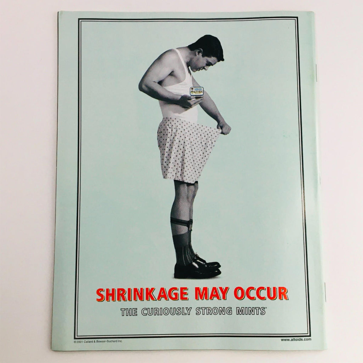 Back cover of Mad Magazine July 2001 No. 407 showcasing a humorous image with the text Shrinkage May Occur and a character in white undergarments.