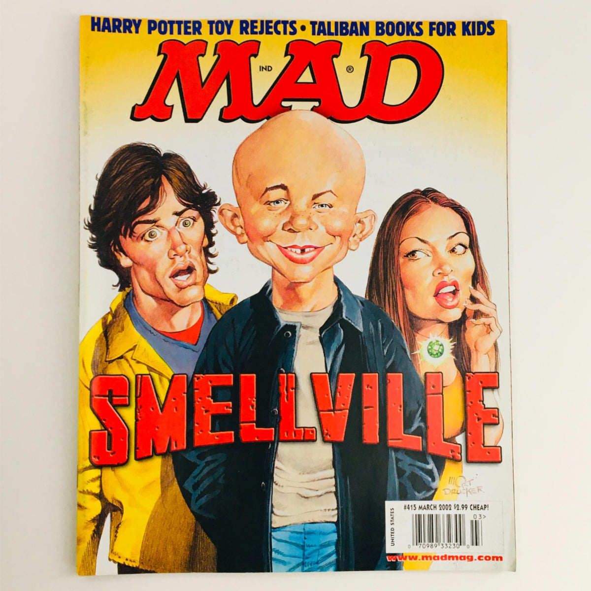 Mad Magazine March 2002 No. 415 Smellville cover featuring cartoon characters with humorous expressions and the iconic Mad logo.