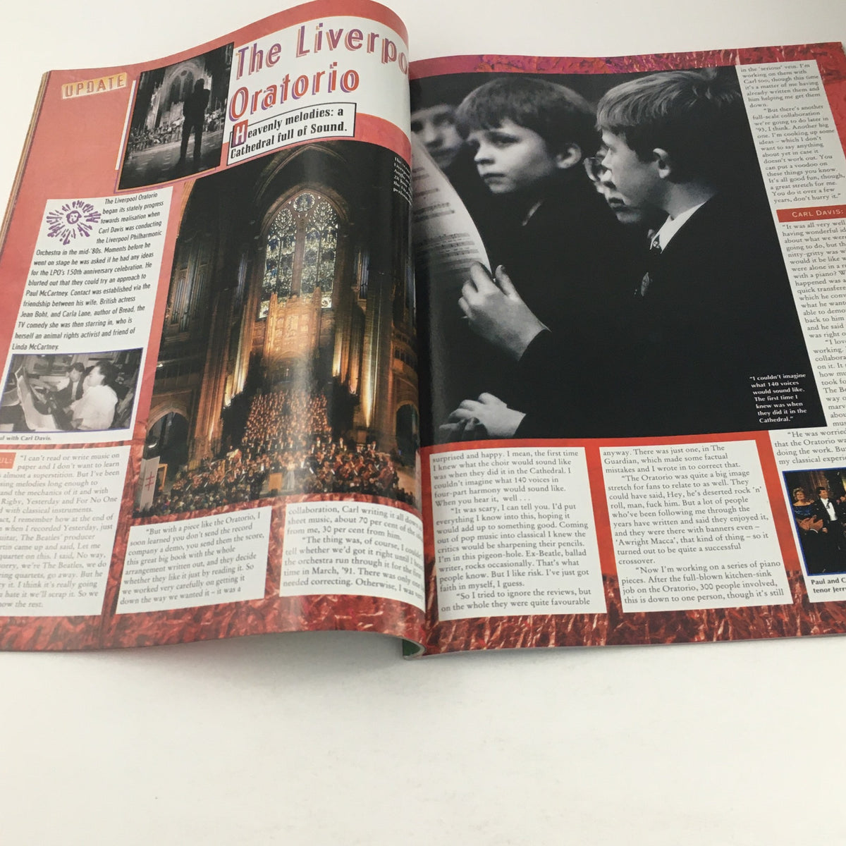 Page from Paul McCartney The New World Tour 1993 featuring an article about The Liverpool Oratorio with a crowd and performance image.