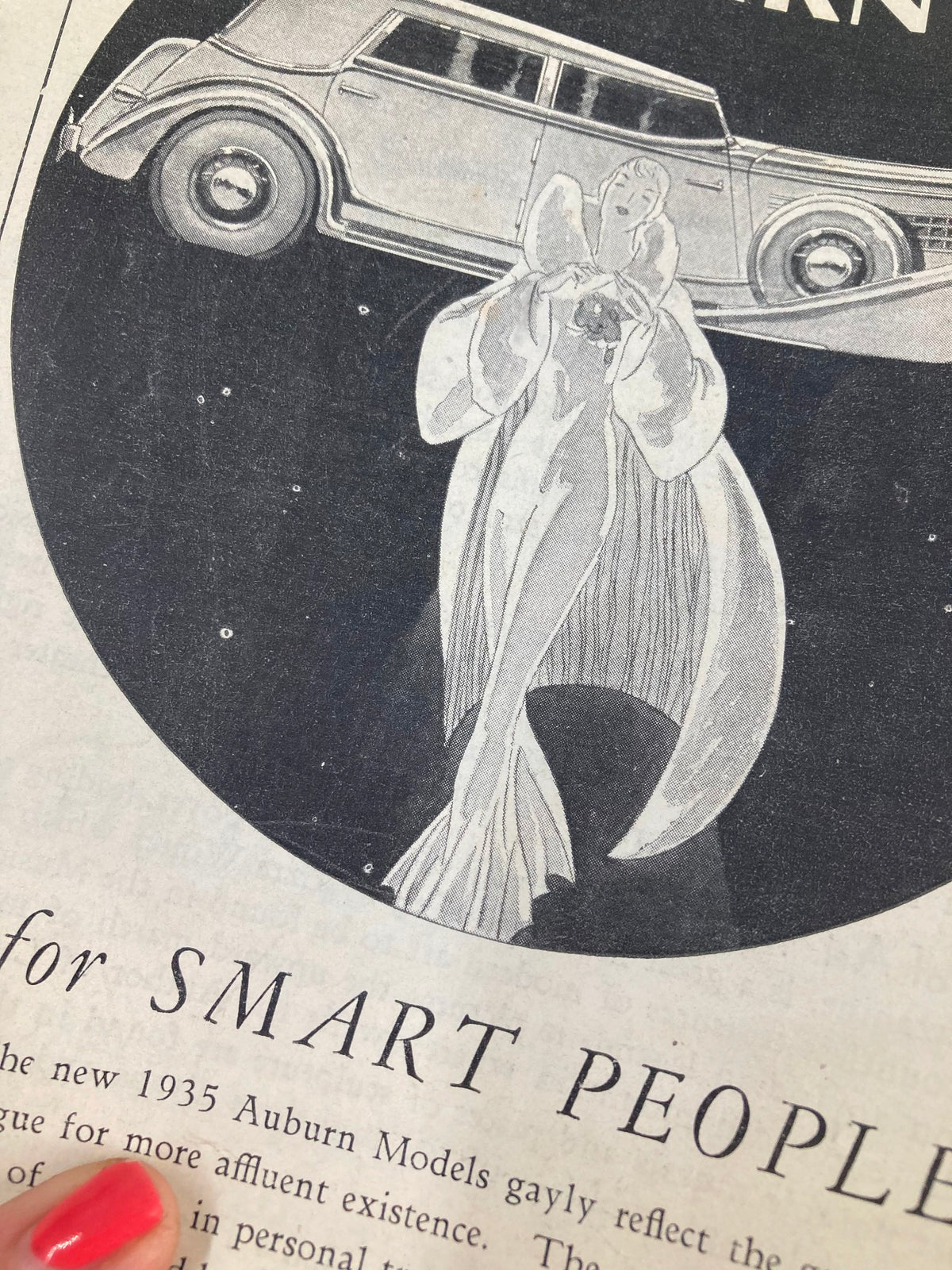 Detailed view from the Auburn automobile advertisement in the 1935 Radio City Music Hall Show Place of the Nation program with a stylish illustration.