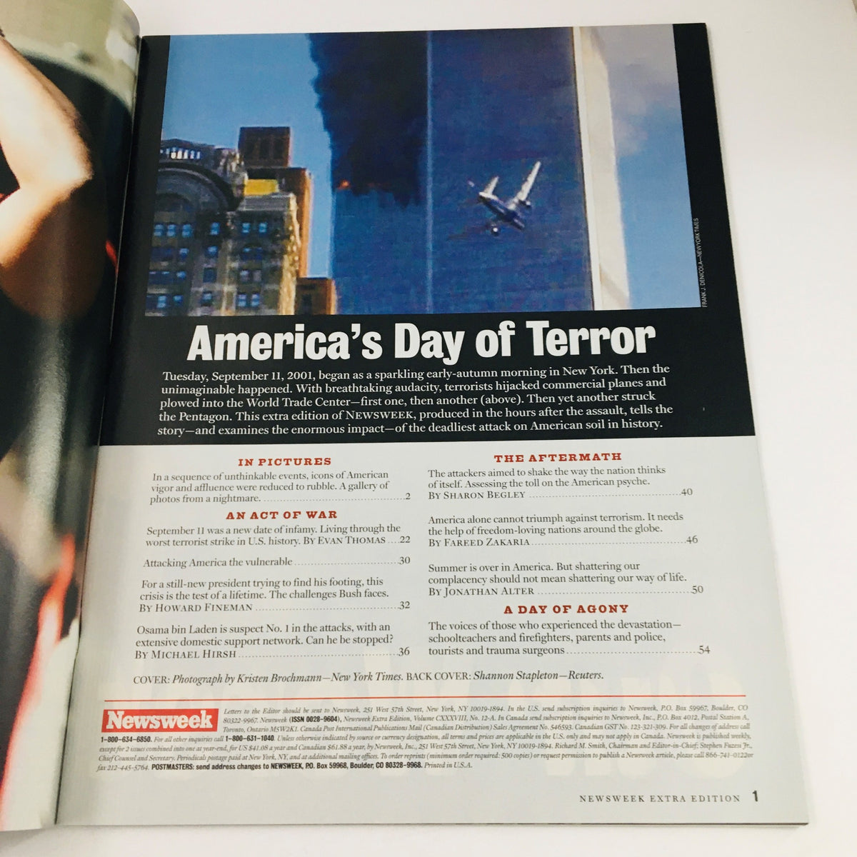 Inside page of Newsweek Magazine, September 11, 2001, detailing 'America's Day of Terror'. The page captures the aftermath of the terrorist attacks with a powerful image of a plane striking the World Trade Center.