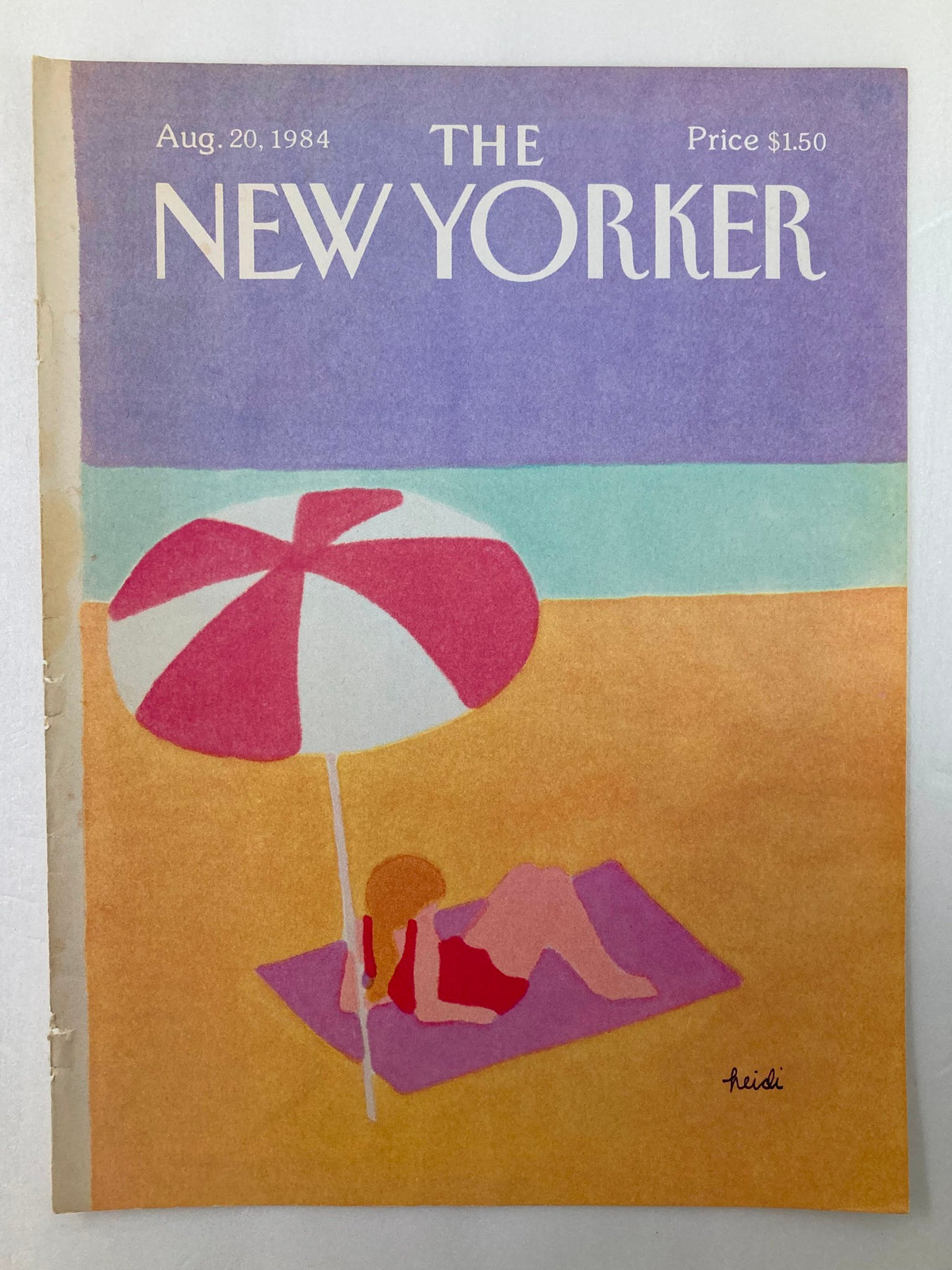 Cover only of The New Yorker August 20 1984 displaying a vintage beach illustration by Heidi Goennel, showing a girl relaxing under a colorful umbrella with vibrant colors reflecting the 1980s leisure culture.