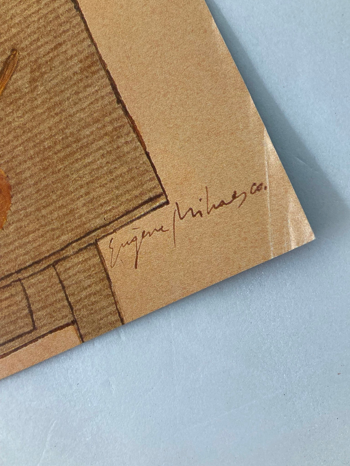 Close-up of The New Yorker October 26 1987 cover by E. Mihaesco showcasing the artist's signature.
