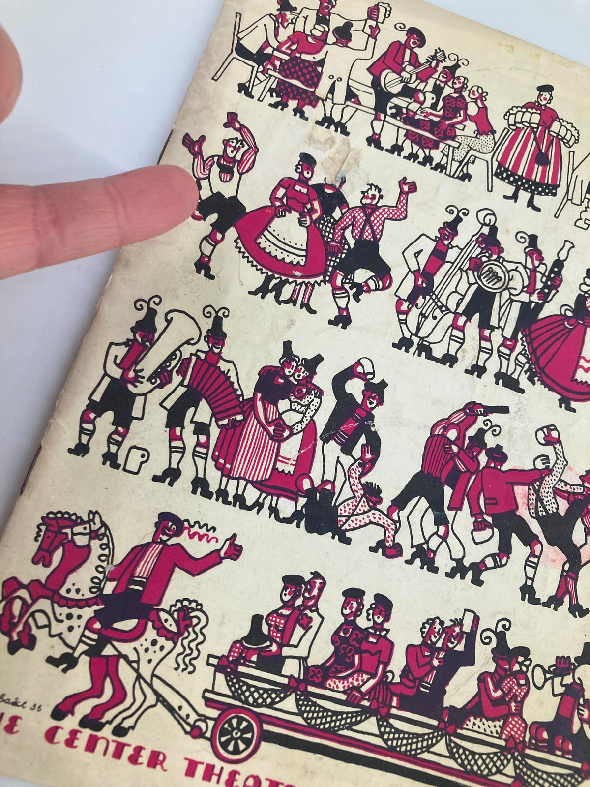 Close-up of the 1937 The Center Theatre Playbill featuring William Gaxton in White Horse Inn, highlighting theatrical illustrations with dancers and musicians in detailed performance poses.