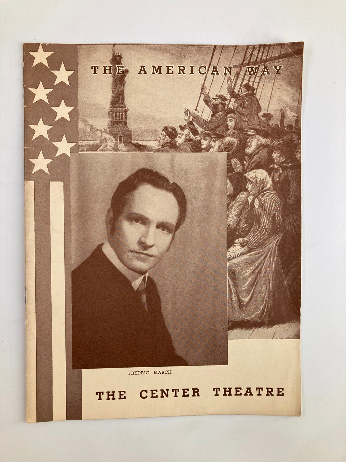 1939 The Center Theatre The American Way in Two Acts by George S. Kaufman, featuring a vintage playbill design with a portrait of Fredric March and classic American imagery like the Statue of Liberty and immigrants.