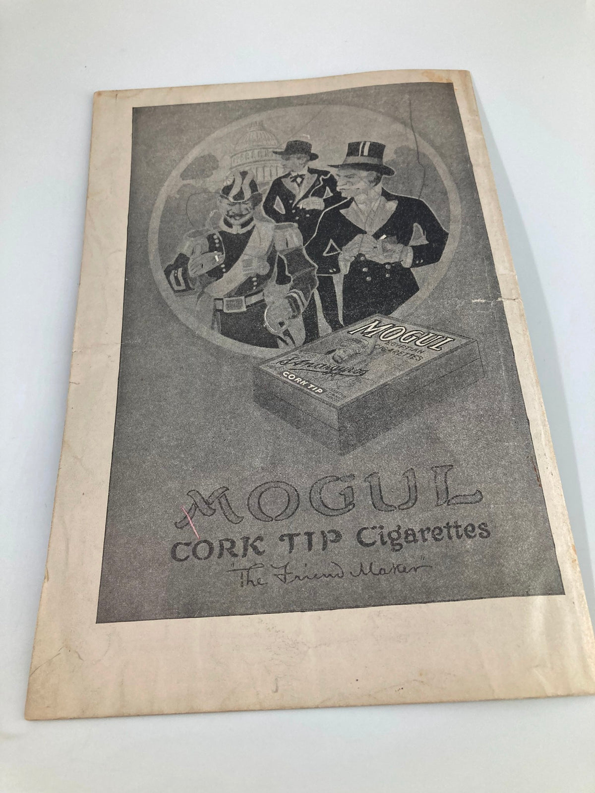 Cover page of a vintage magazine featuring an advertisement for Mogul Cork Tip Cigarettes alongside the theme of the 1913 Proctor's Fifth Avenue Theatre Hunter's Twin Statue Dogs.