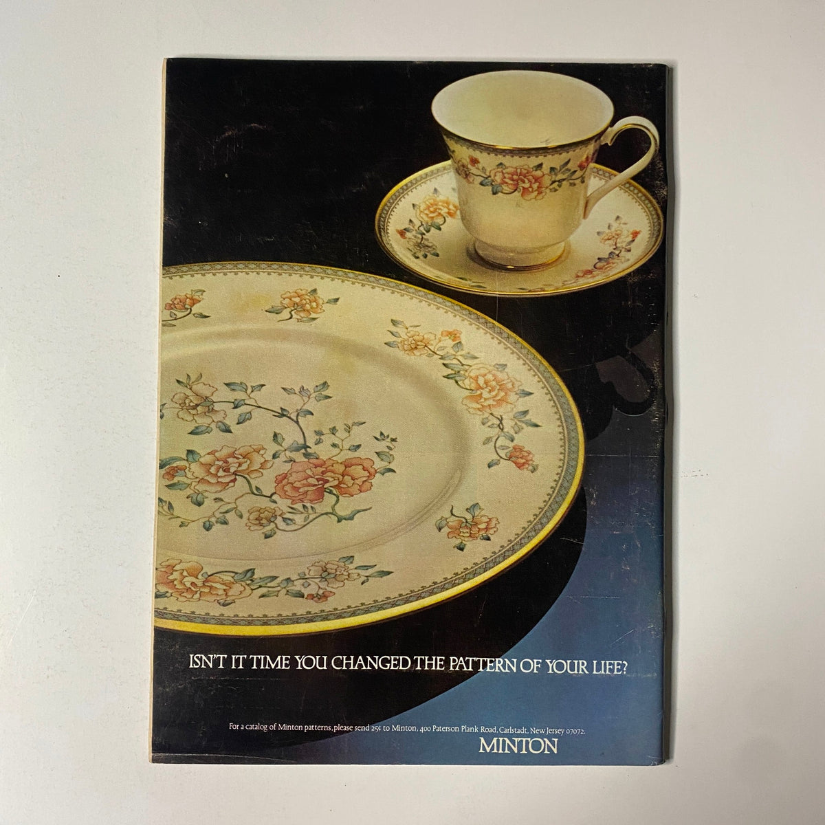 Vintage advertisement page for Minton dinnerware featured in The New Yorker Full Magazine May 29, 1978 showcasing floral patterns on a plate and cup.