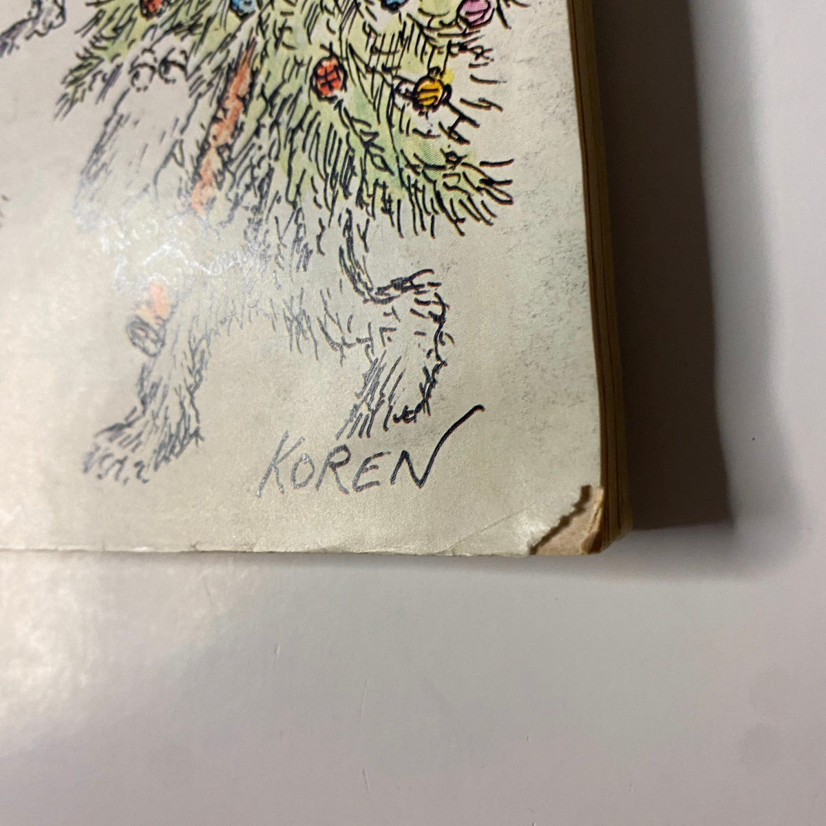 Signature from Edward Koren on the December 12, 1977 issue cover of The New Yorker featuring a festive illustration.