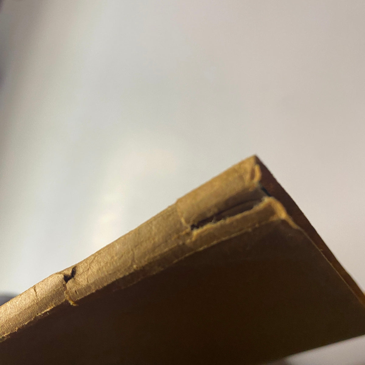 Close-up view of the spine of The New Yorker full magazine July 12, 1976, displaying minor wear typical for its vintage condition.