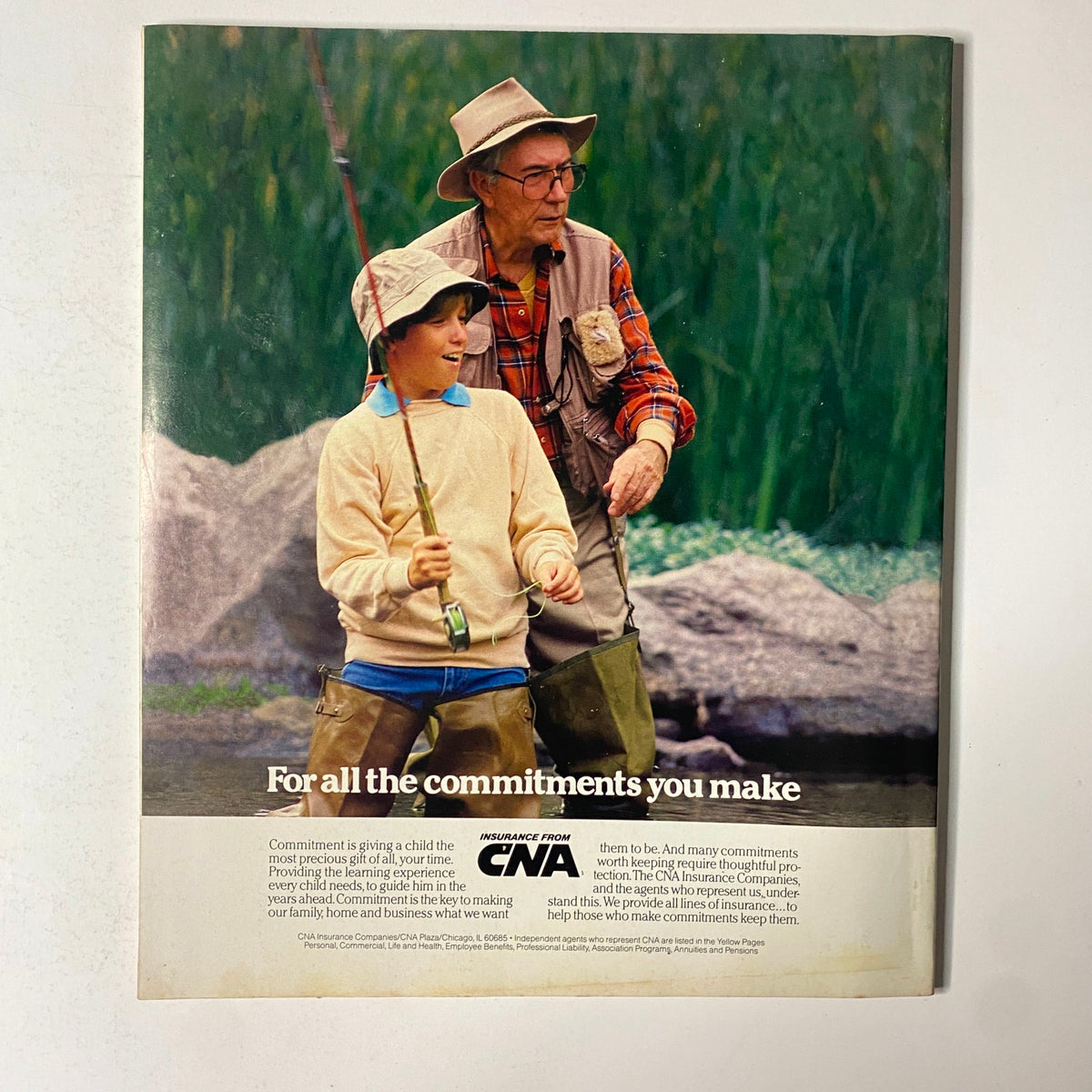 Fortune Magazine April 2, 1984 cover featuring a nostalgic image of a grandfather and grandson fishing together, symbolizing family connections and commitments. Vintage magazine collectible from Original Magazines.