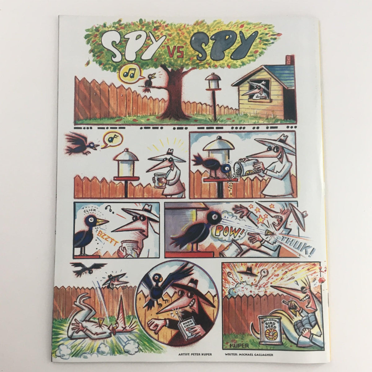 Inside illustration from Mad Magazine November 2000 No. 399 depicting a humorous 'Spy vs Spy' comic strip, highlighting the magazine's signature witty content.