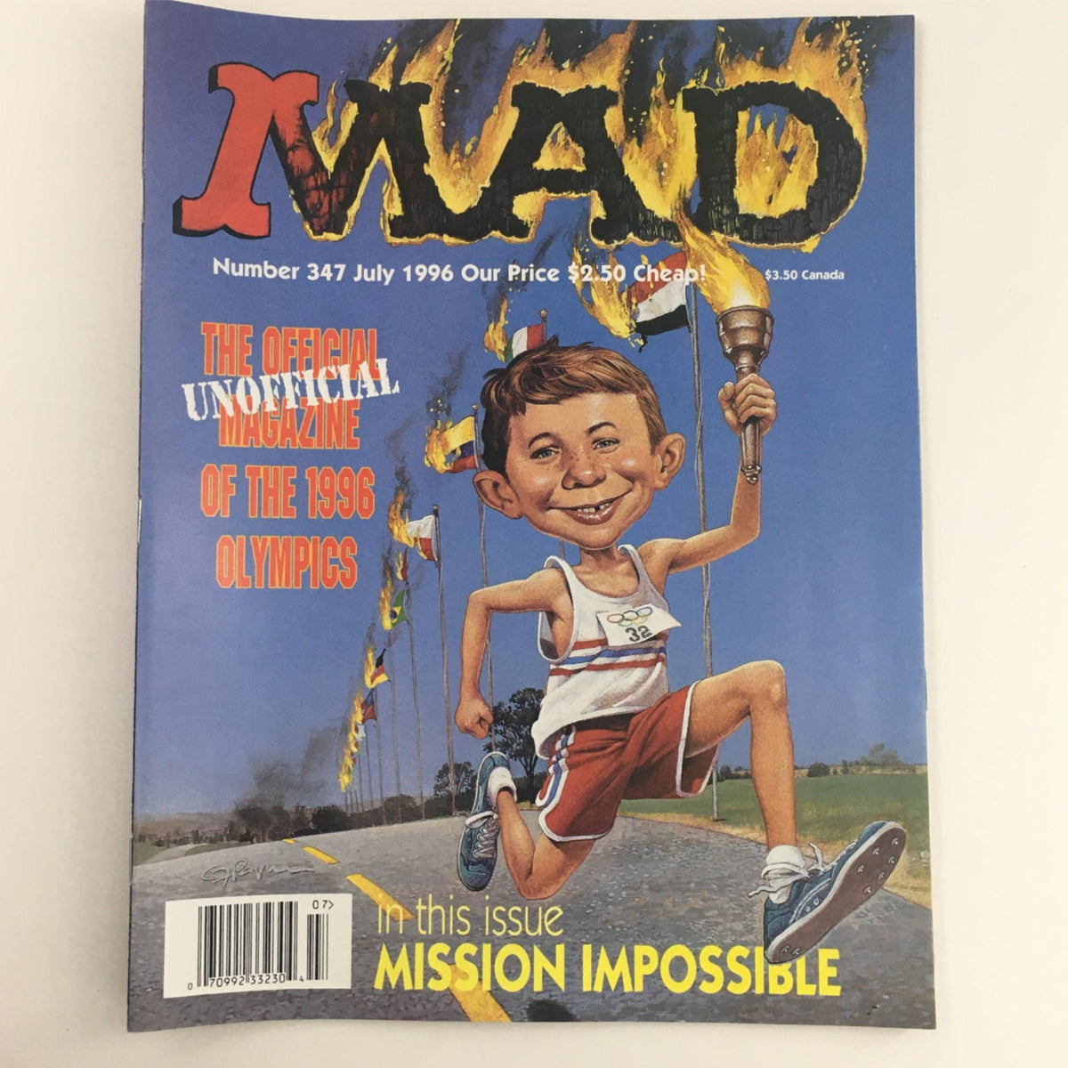 Mad Magazine July 1996 No 347 featuring the unofficial magazine cover of the 1996 Olympics, showcasing a humorous illustration of a young athlete with a torch among Olympic flags.