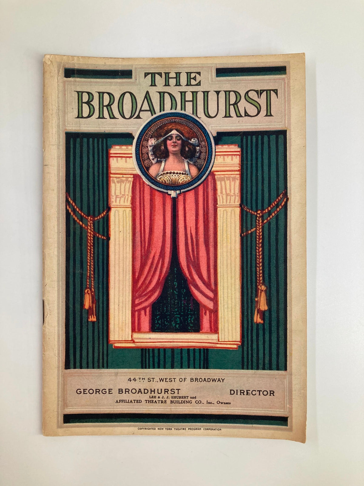 Cover of the vintage magazine "The Broadhurst" featuring the title and artwork for the 1924 play "Beggar on a Horseback" by George S. Kaufman, showcasing theatrical elegance.