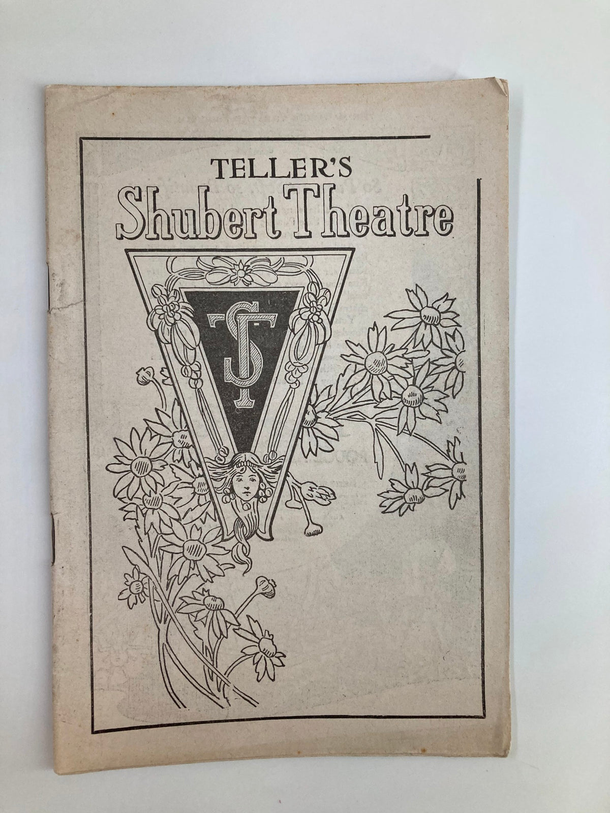 Cover page of the 1920 Teller's Shubert Theatre Playbill featuring floral designs and the title prominently displayed.