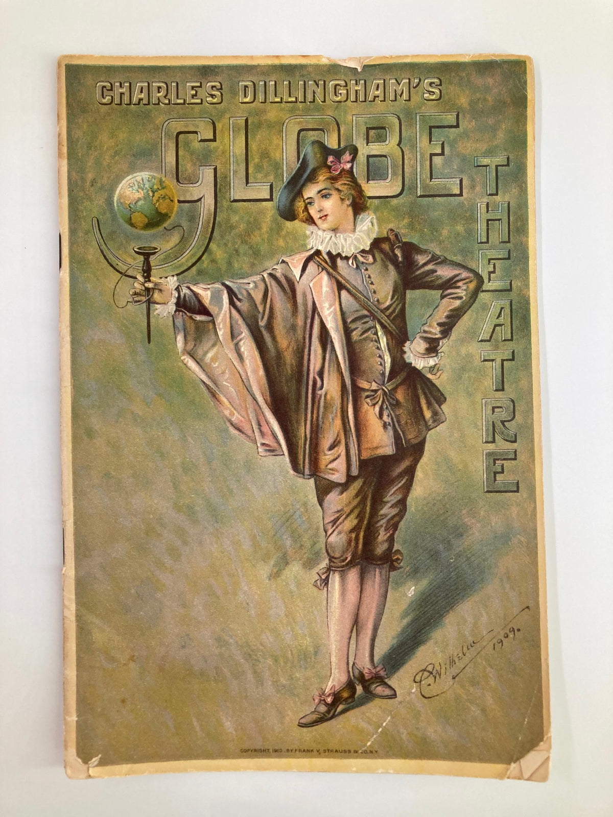 Front cover of the 1913 Globe Theatre Playbill featuring Montgomery & Stone and Elsie Janis in The Lady of the Slipper, showcasing vibrant artwork and theater theme.