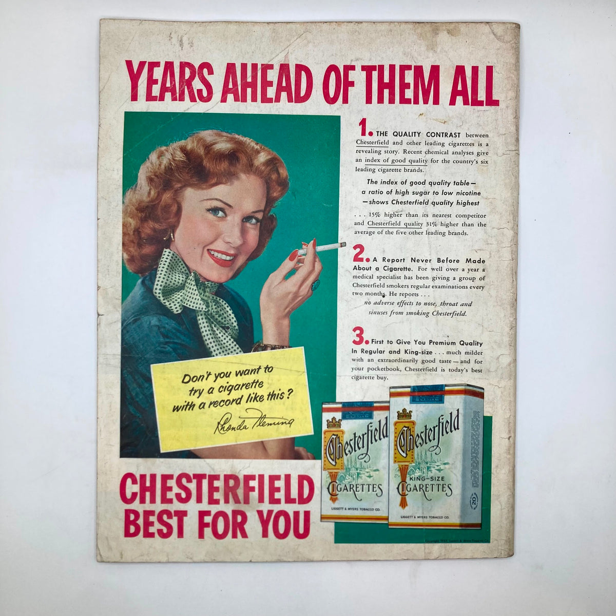 Vintage advertisement from the Saturday Evening Post Magazine July 25 1953 for Chesterfield cigarettes, featuring a woman promoting the brand.