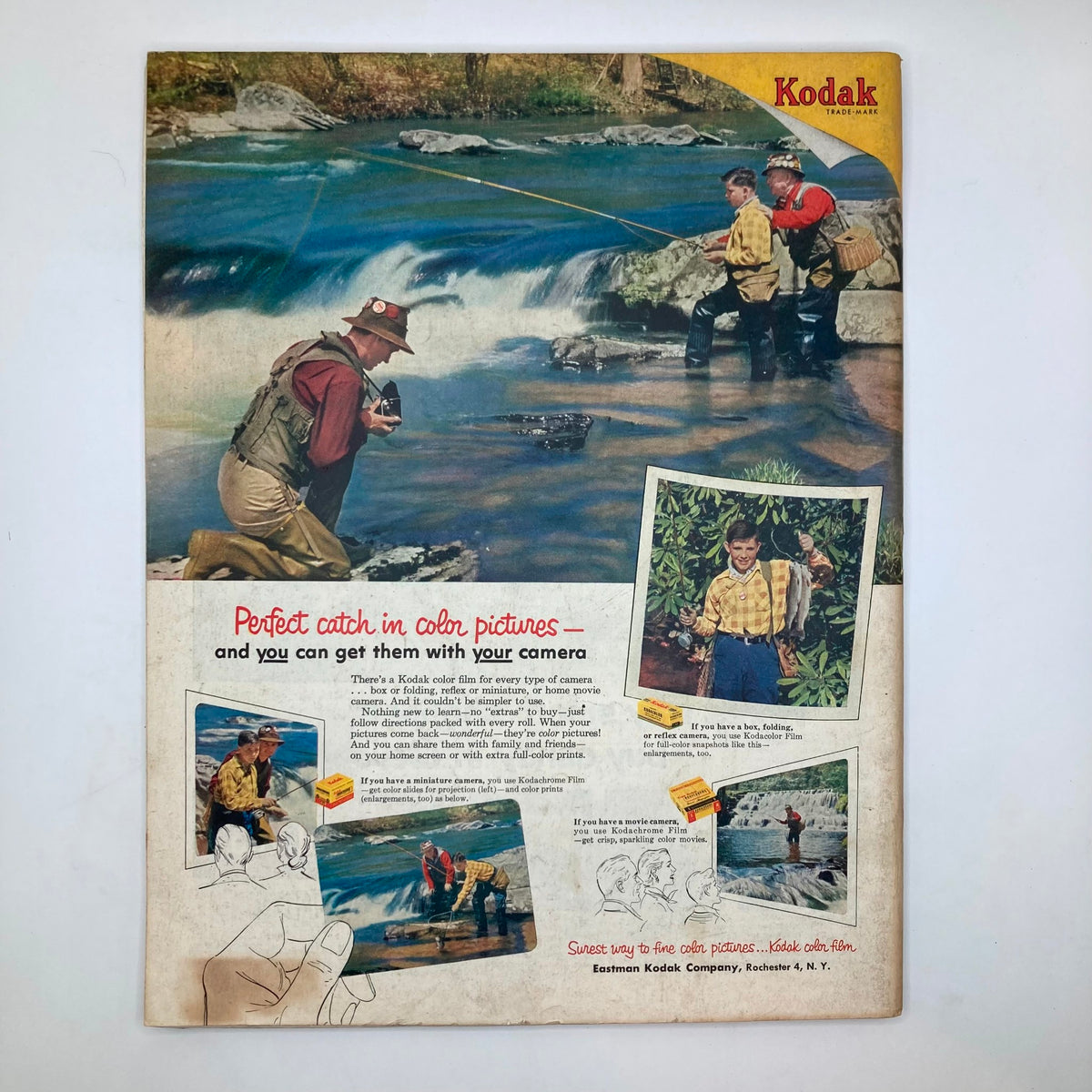 Vintage advertisement featuring fishing scene and Kodak film information, from the Saturday Evening Post Magazine May 9, 1953. The image shows fishermen by a river, illustrating the joy of capturing colorful memories with Kodak cameras.