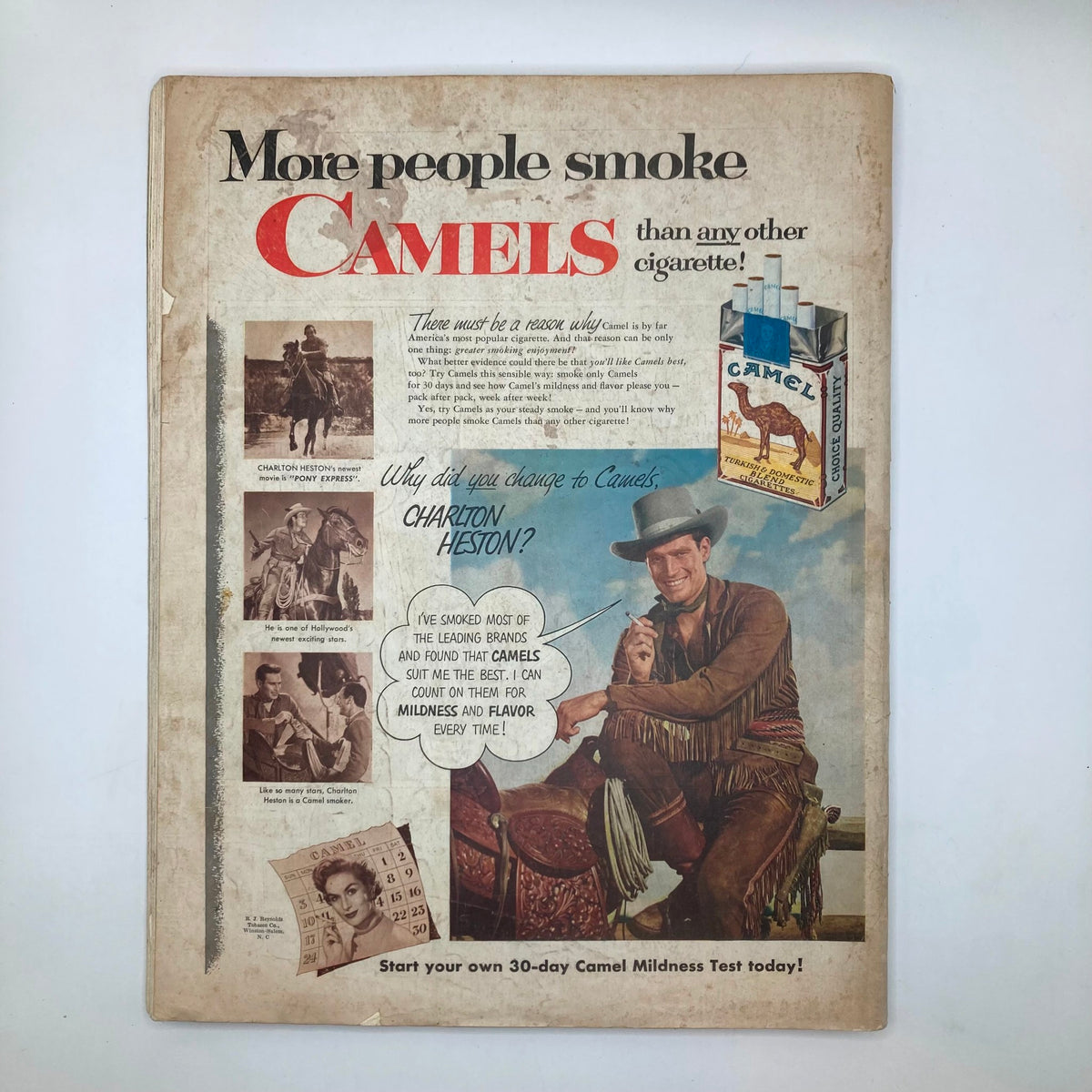 Back cover of the Saturday Evening Post Magazine March 28 1953 promoting Camel cigarettes with an illustration of Charlton Heston, ideal for collectors and vintage advertising enthusiasts.