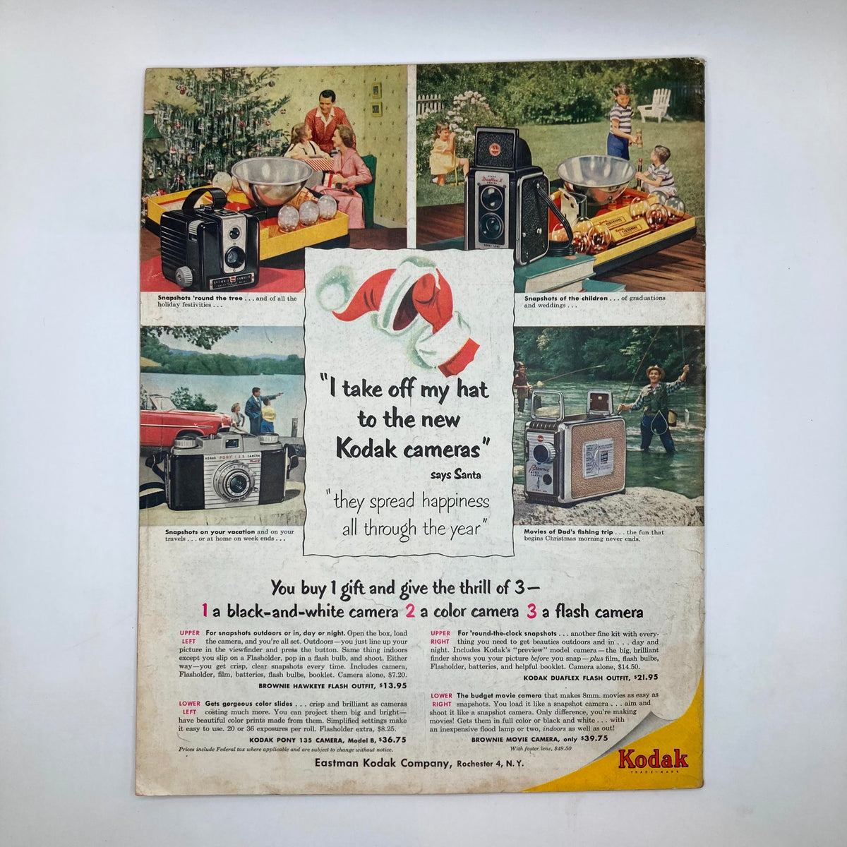 Back cover of Saturday Evening Post Magazine December 19, 1953 advertising Kodak cameras, featuring colorful images and festive decorations, reflecting 1950s holiday culture.