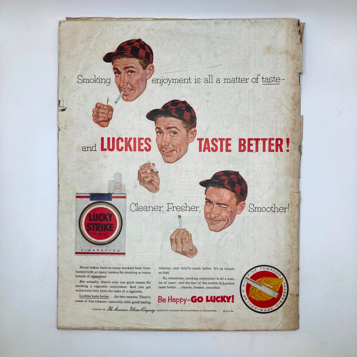 Back cover of the Saturday Evening Post Magazine from November 14, 1953, showcasing a Lucky Strike cigarette advertisement with images of a smiling young man promoting freshness and enjoyment in smoking.