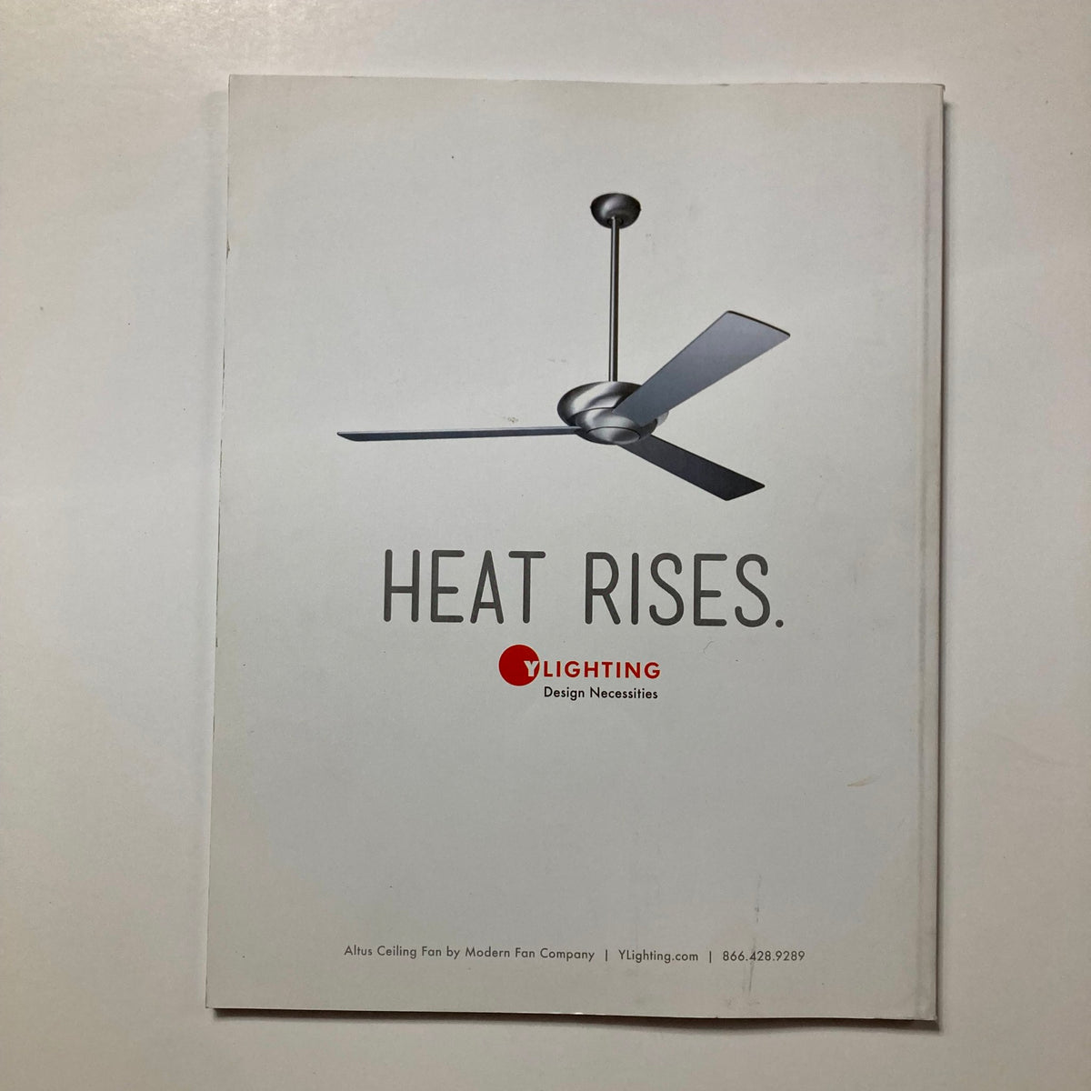 Back cover of Atomic Ranch Magazine Summer 2016 promoting modern ceiling fans with the tagline 'HEAT RISES.' highlighting design essentials.
