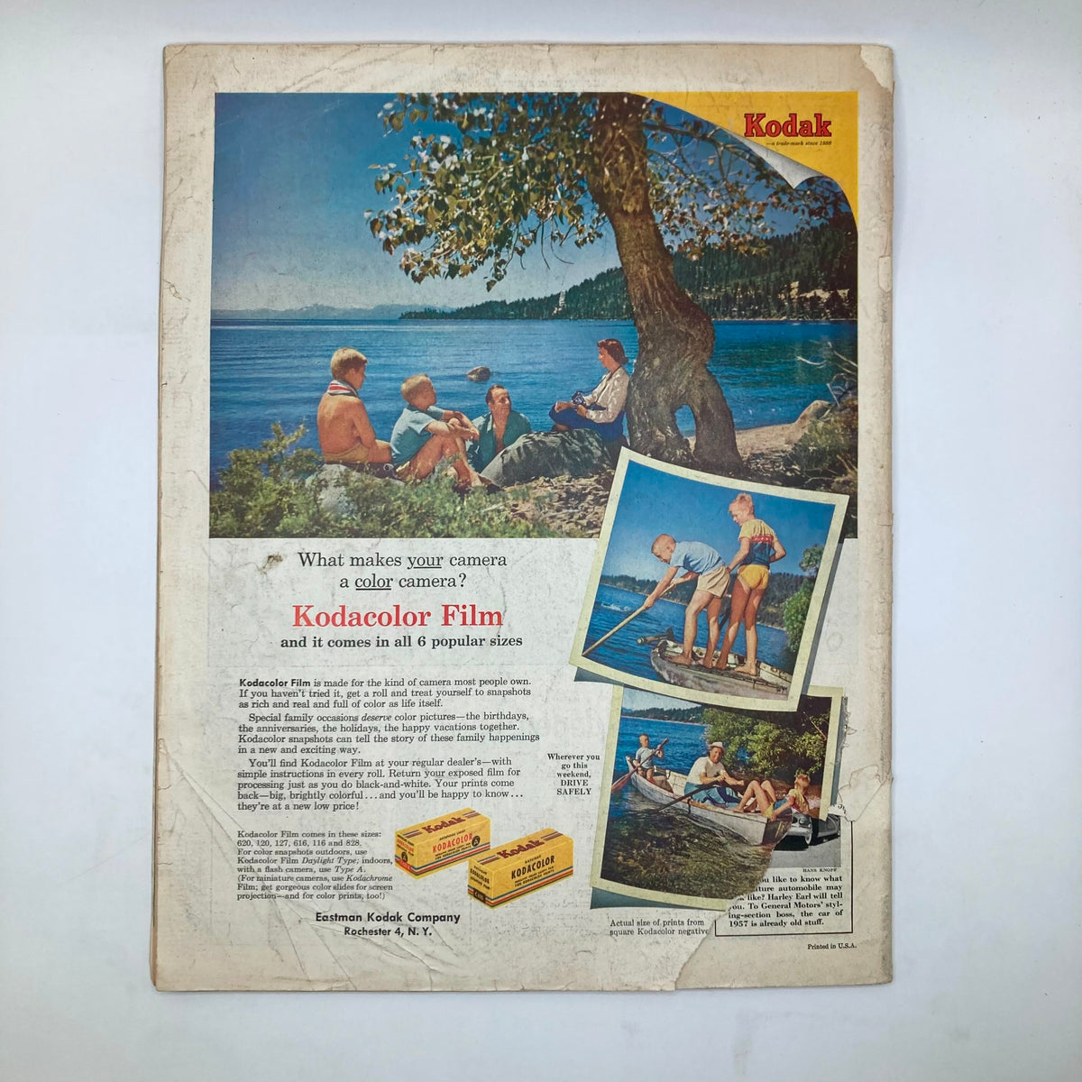 Back cover of the Saturday Evening Post Magazine from July 31, 1954, advertising Kodak Color Film with a picturesque family scene by a lake.