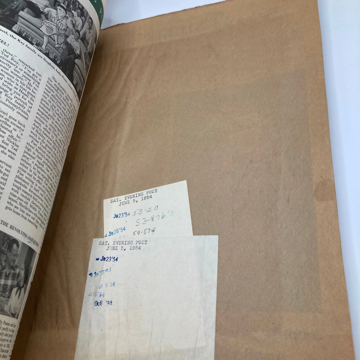 Back page of Saturday Evening Post Magazine June 5, 1954 showcasing the interior paper with handwritten notes and markings, adding to the vintage character of the publication.