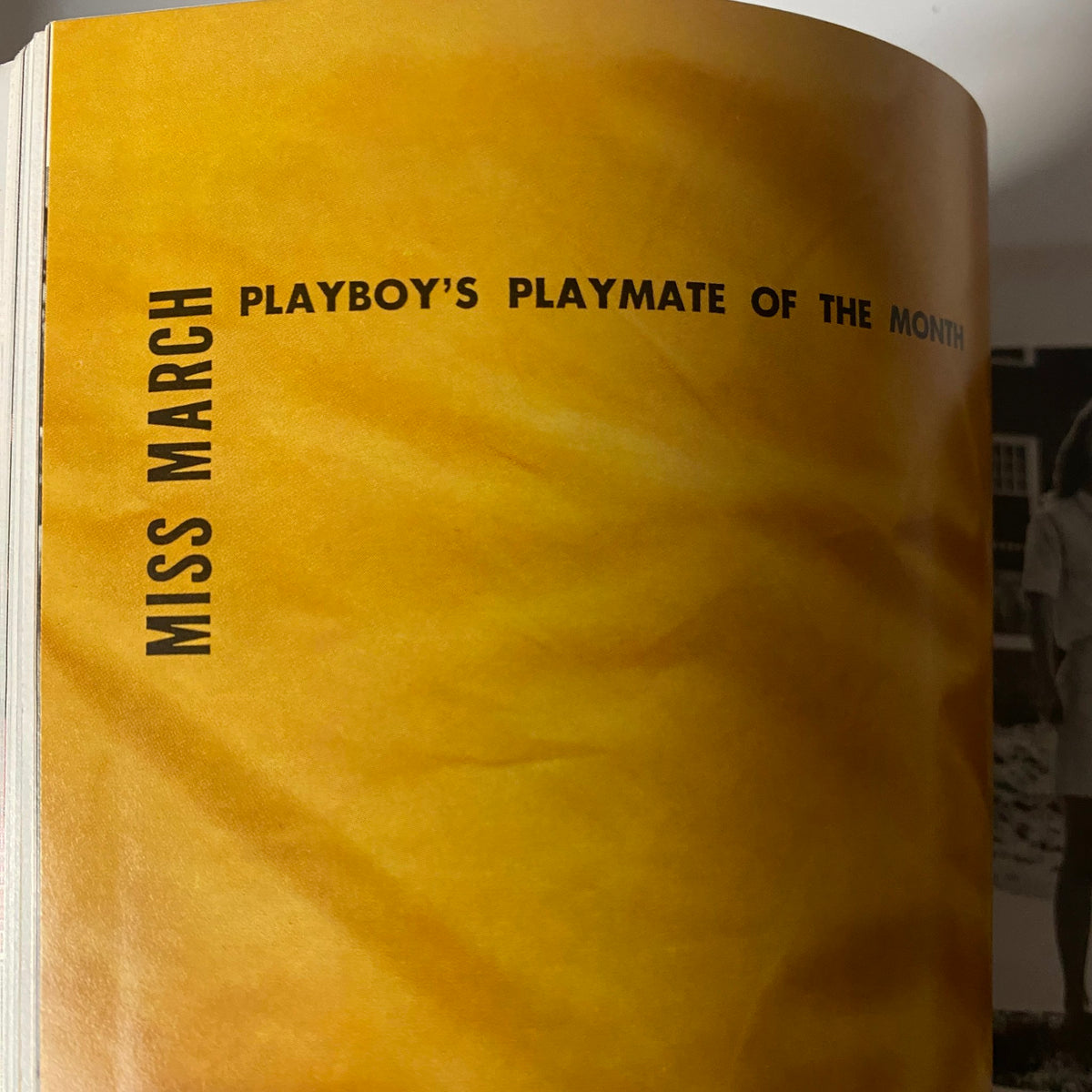 Inside page of Playboy Magazine March 1969 featuring the title 'Miss March Playboy's Playmate of the Month' with a vibrant yellow background, showcasing vintage magazine design.