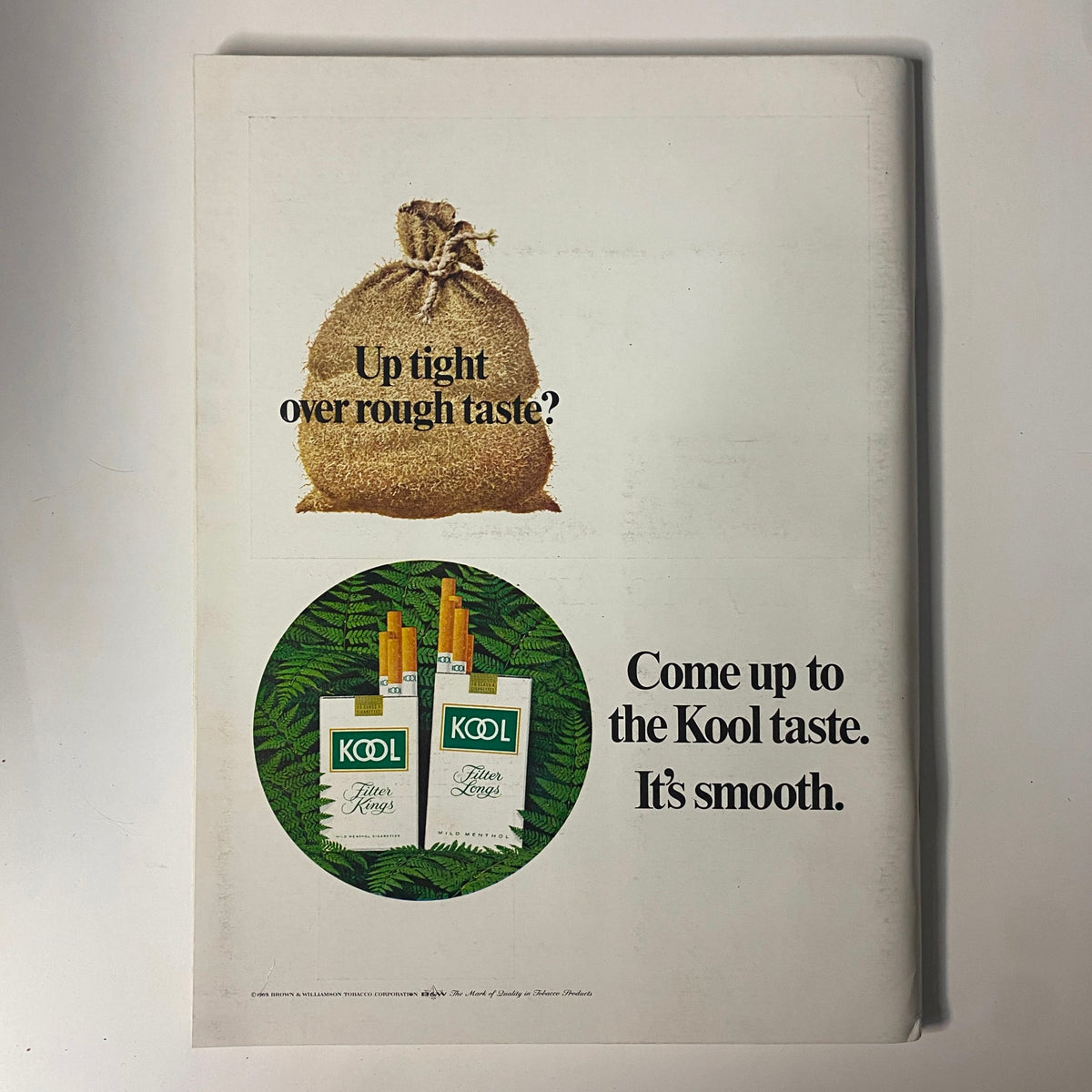 Advertisement page from Playboy Magazine March 1969 featuring Kool cigarettes, highlighting a playful slogan 'Come up to the Kool taste. It's smooth.' against a backdrop of green foliage.