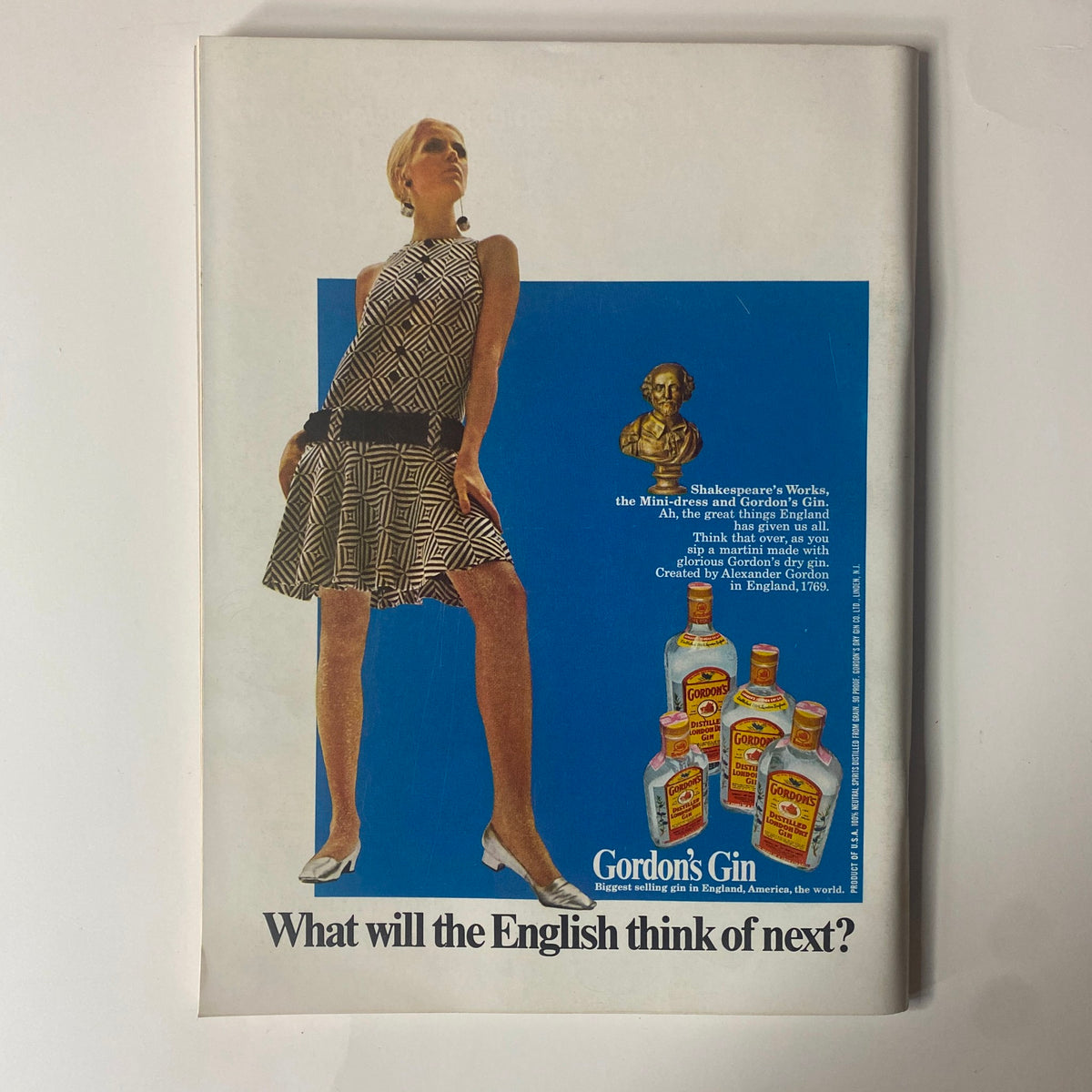 Back cover of Playboy Magazine June 1967 displaying an advertisement for Gordon's Gin with a stylish model in a mini-dress, capturing the fashion and culture of the 1960s.
